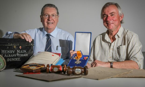 Caledon MD Henry Main's grandson Jim Shearer (left) brought his grandfather's archive to Dundee. He's pictured with Jack Reilly.