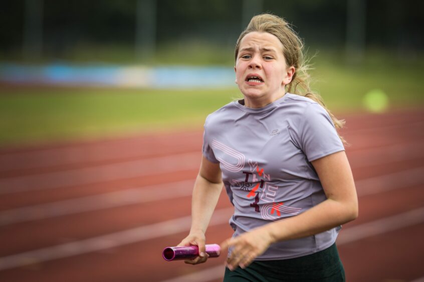Georgina Ulyatt, 12, from Intchure PS gives it her all in the relay