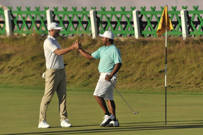 Dustin Johnson (left) and Harold Varner after their practice round at The Open 2022 on Sunday July 10