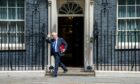 Boris Johnson leaves Downing Street.