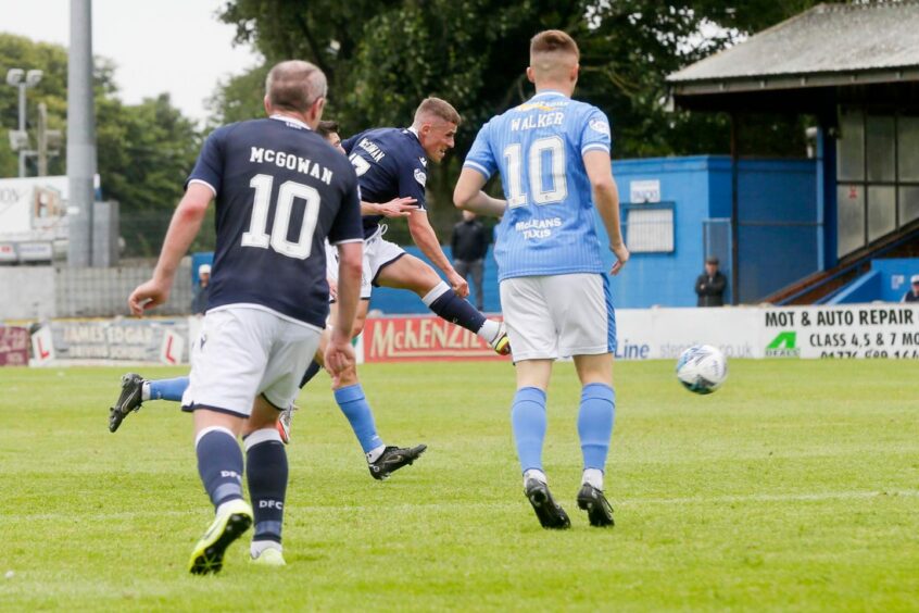 McCowan curls in goal No 3 at Stranraer.