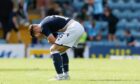 Dejected Dundee midfielder Josh Mulligan at full-time against Partick Thistle.