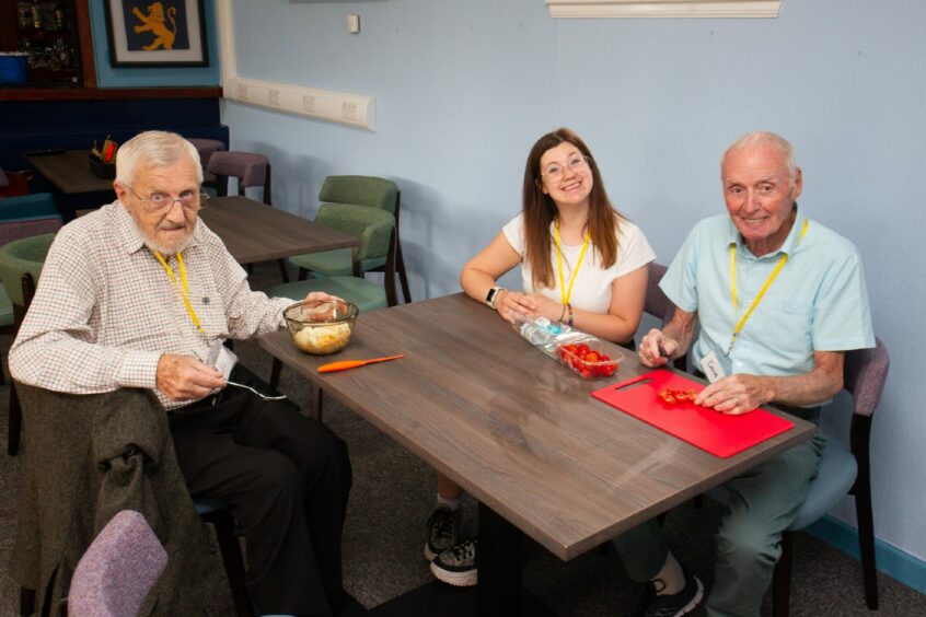Activities co-ordinator Becca Paton with Bill Kilgour (left) and Dave Coull.
