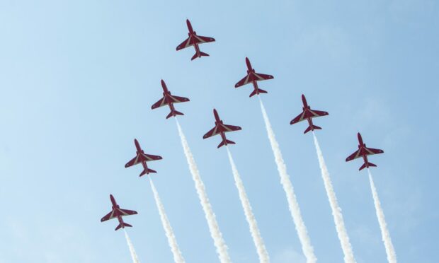 The Red Arrows pass over Montrose Air Station Heritage Centre. Pic: Paul Reid.