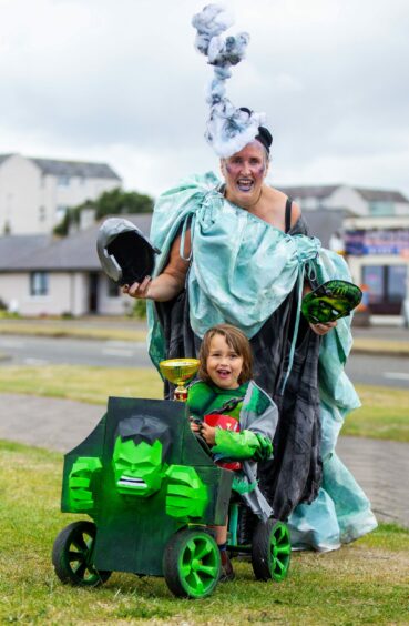 Four-year-old Arowe Hurst and his grandmother Karen Hurst with the winning entry