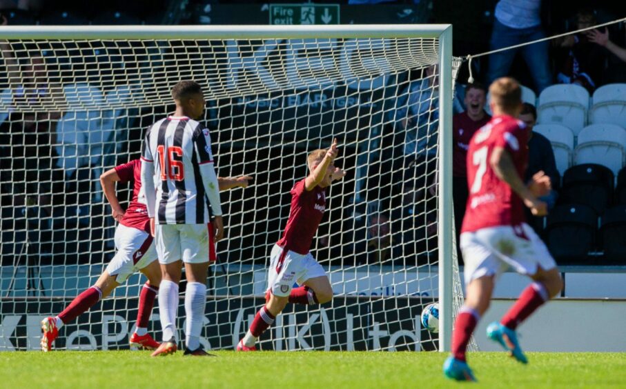 Dylan Paterson wheels away after netting the winner at St Mirren.
