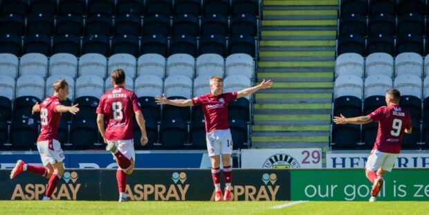 Dylan Paterson celebrates after his late strike won the tie for Arbroath.