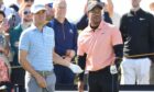 Tiger Woods and Justin Thomas in practice on Sunday at the Old Course.