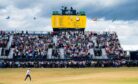 Tiger Woods walks up the 18th at the 150th Open in St Andrews. Image: SNS Group.