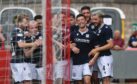 Cammy Kerr celebrates making it 2-0 to Dundee against Queen's Park.