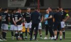 Gary Bowyer gives his post-match team talk on the pitch after beating Queen's Park in July.