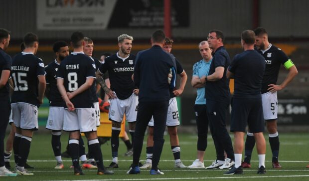 Gary Bowyer gives his post-match team talk on the pitch after beating Queen's Park in July.