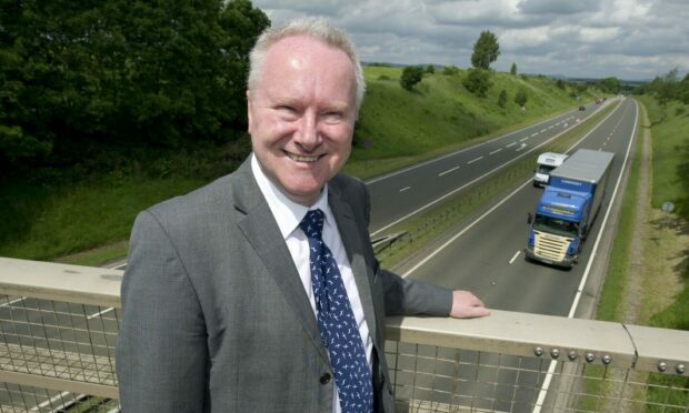 Former Infrastructure Secretary Alex Neil after making an A9 dualling announcement in 2012