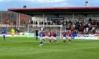 The Arbroath players celebrate Dylan Paterson's opener.