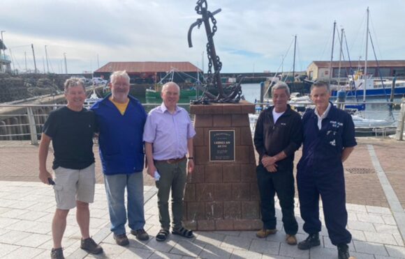 Descendant Tony Smith, Arbroath RNLI operations manager Alex Smith, descendant Dale Smith, assistant harbourmaster Jim Swankie and harbour assistant Grant Milne harbour assistant at the memorial plaque unveiling.