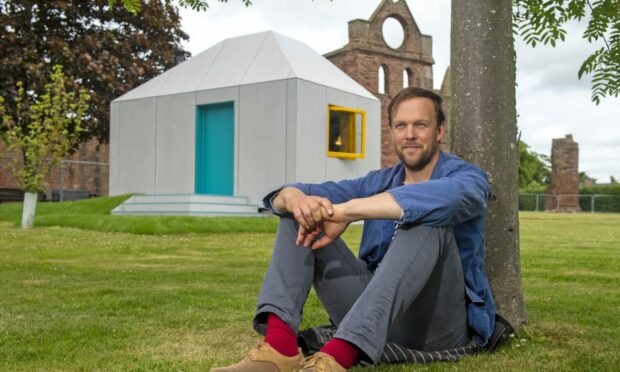 Artist Bobby Niven outside the New Scriptorium at Arbroath Abbey.