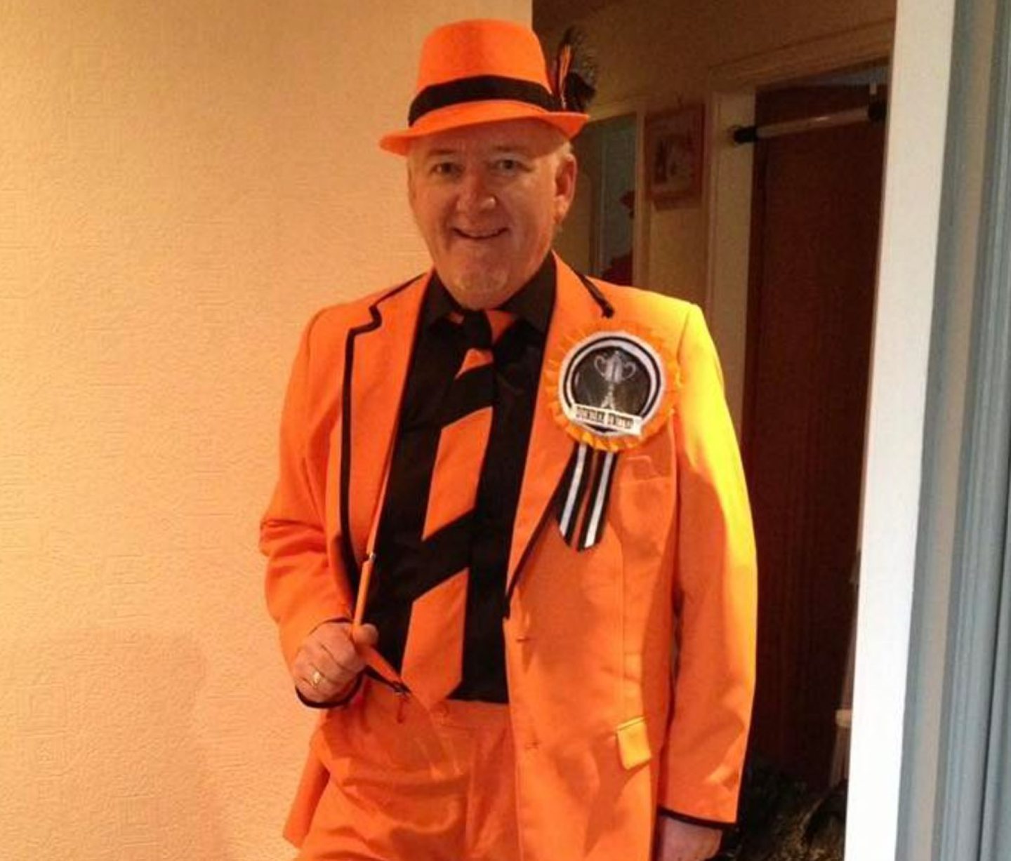 George in a Dundee United suit.