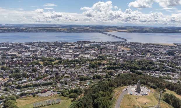 To go with story by Mark Asquith. The installation is part of Dundee?s Beano-themed festival Summer (Bash) Streets Festival which will be running over the next 10 days. Picture shows; Drone pictures of the Beanotown sign that is on The Law. Dundee. Supplied by Ben Hirst Date; 15/07/2022