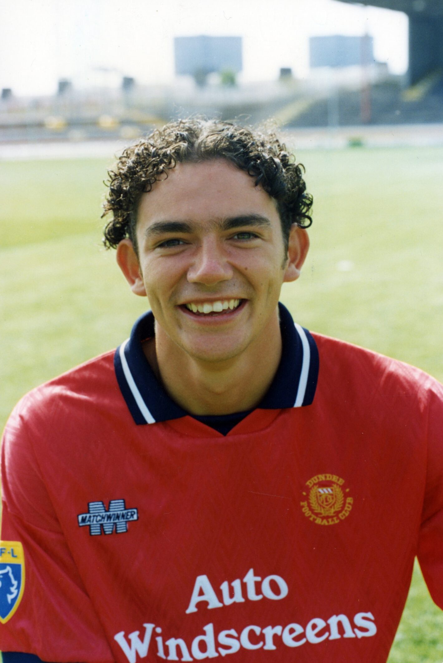 Marcus Dailly in the 1995-1996 red away Dundee FC shirt 