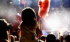 child at a music festival for families