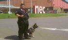 team from Wright's K9 Security Services in front of NEC Birmingham