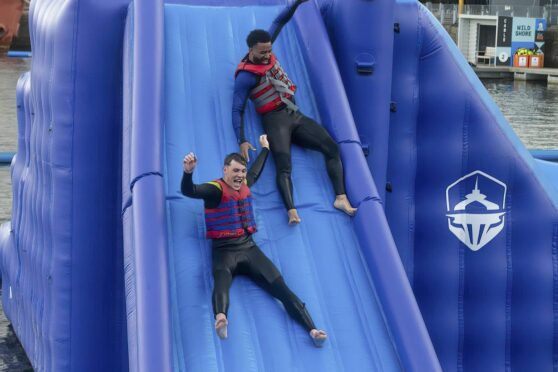 Alex Jakubiak and Josh Mulligan had a whale of a time as Dundee took to the city's Wild Shore aqua park
