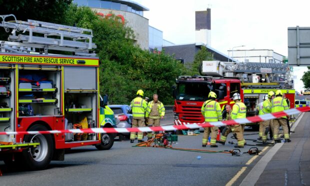 Emergency services responding to a crash on Pittencrieff Street, Dunfermline.