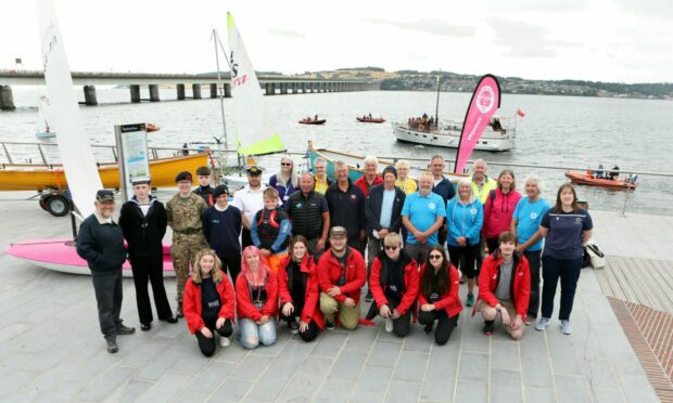 Members of the Tay Estuary Water Sports Hub at the launch beside the Urban Beach at the waterfront.