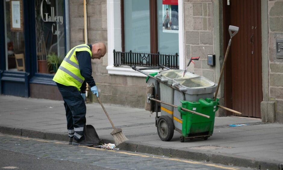 Street cleaners on Brook Street in Broughty Ferry on Wednesday morning