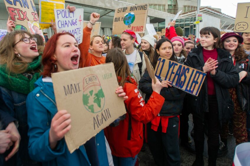 Climate change protest outside the Scottish Parliament, Holyrood, Edinburgh. 