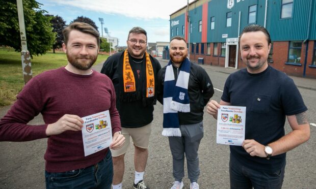 Fans for Foodbanks Dundee volunteers standing on Tannadice Street. (Left to right) Darren Thomson, Marty Smith, Liam McKelvie and Daniel Gearie.