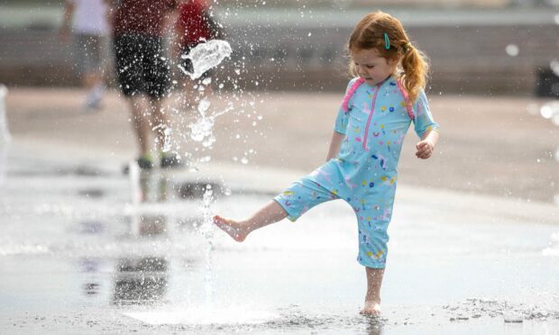 Lucy Pattenden, 3, splashing around enjoying the water at Dundee's Urban Beach.