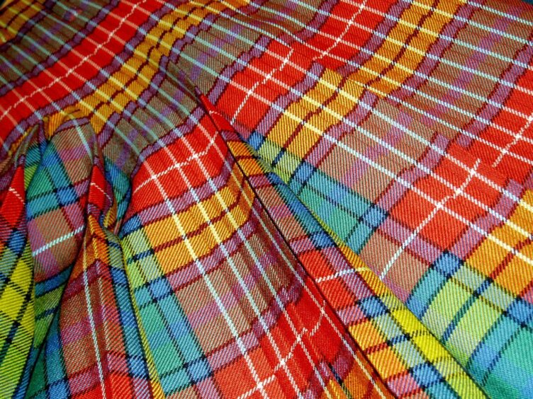 a tartan kilt spread out