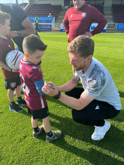 Luca and his brother, Rocco, were invited to meet the Arbroath players.