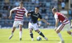 Left-back Jordan Marshall in action for Dundee this season.