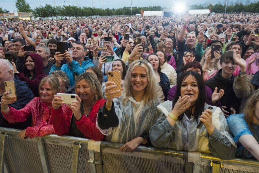 photo shows a large audience at Slessor Gardens watching Paloma Faith.