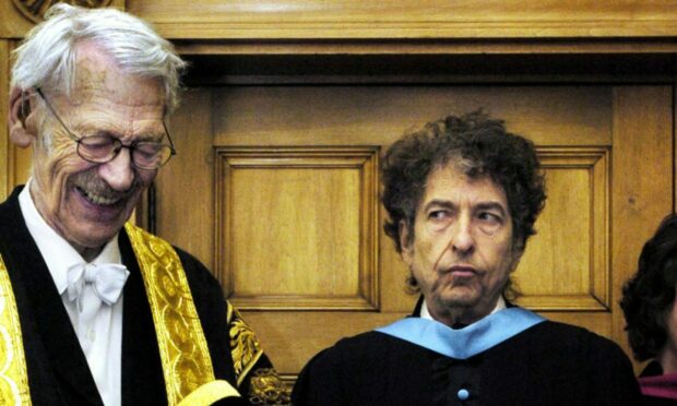 Rock legend Bob Dylan (right) at the University of St Andrews Wednesday June 23, 2004, after he received an honorary degree of Doctor of Music from Sir Kenneth Dover, Chancellor of the university.