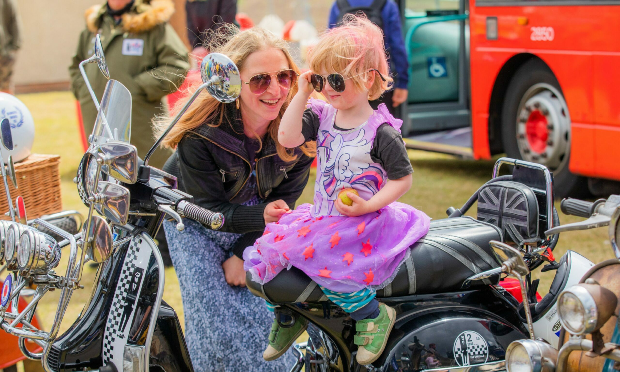 Sonny Thompson (aged 3) and his mum Rachael Thompson sitting on the mod bikes at the gala fete.  Pic credit Steve MacDougall / DCT Media