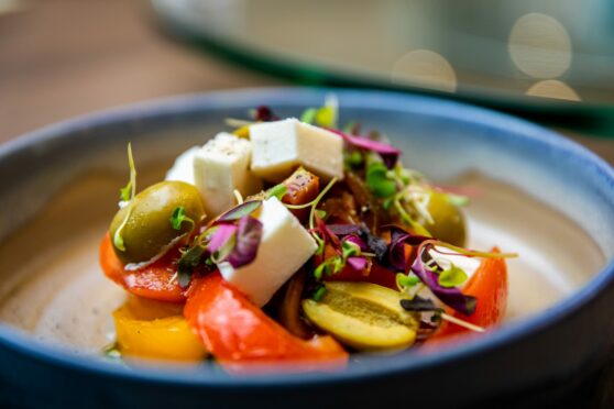 Courier - Food & Drink - Brian Stormont - Christies Scottish Tapas - CR0036751 - Dunfermline - Picture Shows: Heritage Tomato & Vegan Feta Salad, Gordal Olives, Pickled Shallots, Micro Herbs, Tomato Powder - Wednesday 6th July 2022 - Steve Brown / DC Thomson