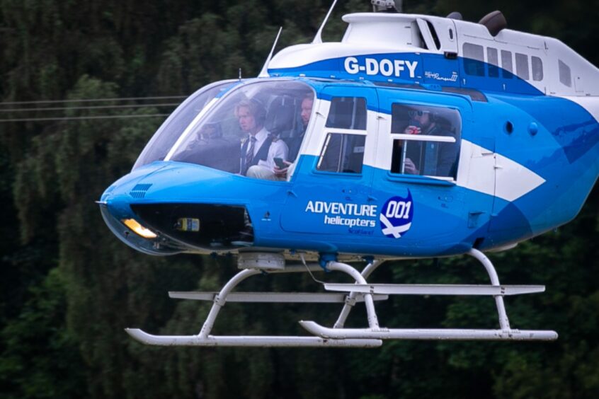 Coming in to land, a helicopter takes visitors to The Open. Picture Steve Brown / DCT Media.