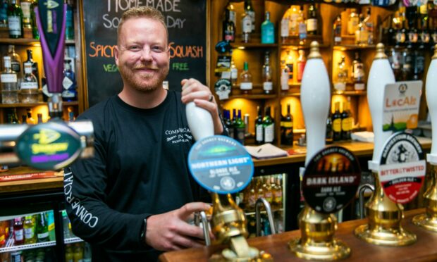 Andrew Black in The Commercial Inn, Dunfermline, which has won the CAMRA Pub of the Year Scotland 2022.
