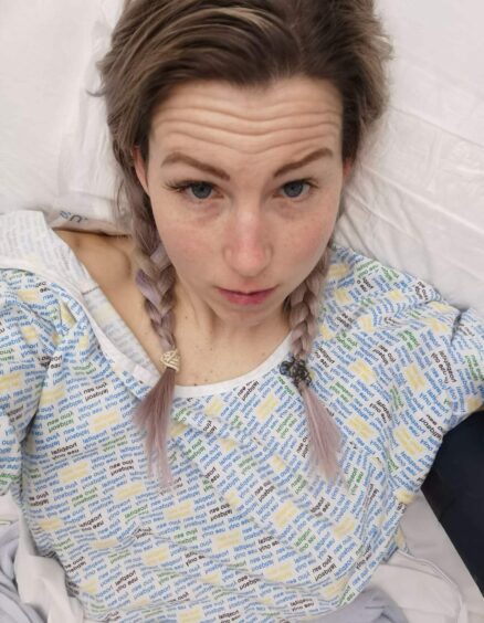 Lynn, of Lynn Hunter Fitness, in hospital after her surgery.