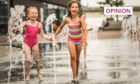 Lyla Stewart, 6 and Amelia Khokhar, 7, cooled off at Dundee's waterfront as Scotland melted in the heatwave. Mhairi Edwards/DCT Media. Dundee. Supplied by Mhairi Edwards/DCT Media Date; 19/07/2022