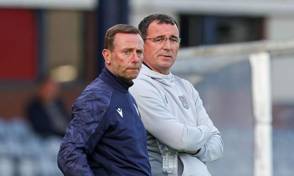 Grayson is well known to Dundee boss Gary Bowyer and assistant Billy Barr (left).
