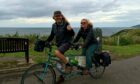 'Freewilders' Colin Unsworth and Sadie Tann on their tandem bike.