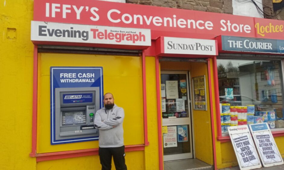 Iffy Yaqub outside his store.