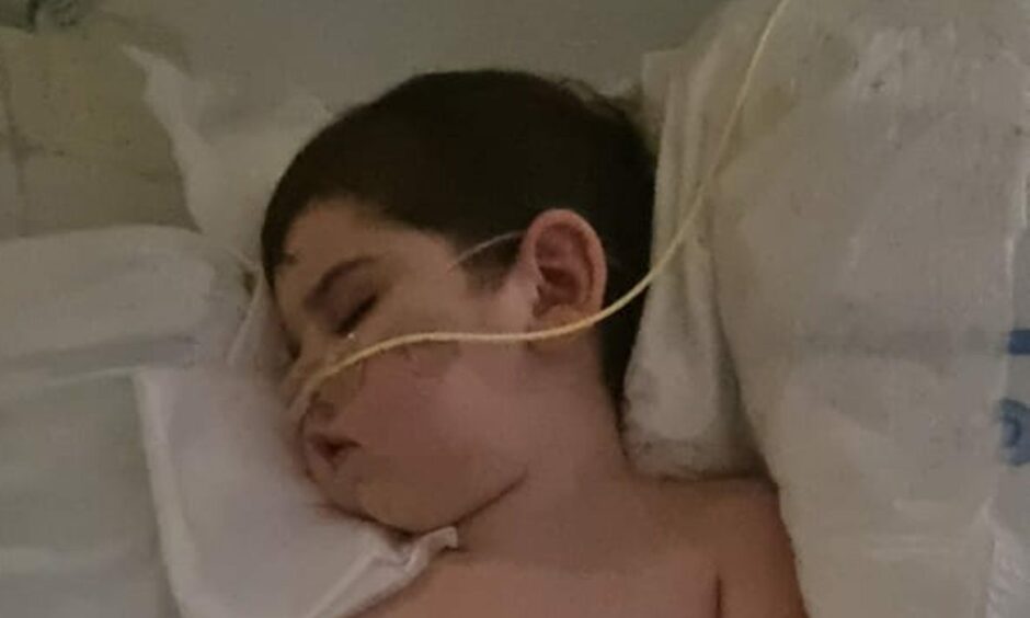 Jaxon ventilated in hospital.