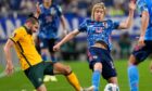 Aziz Behich, left, in action against Japan.