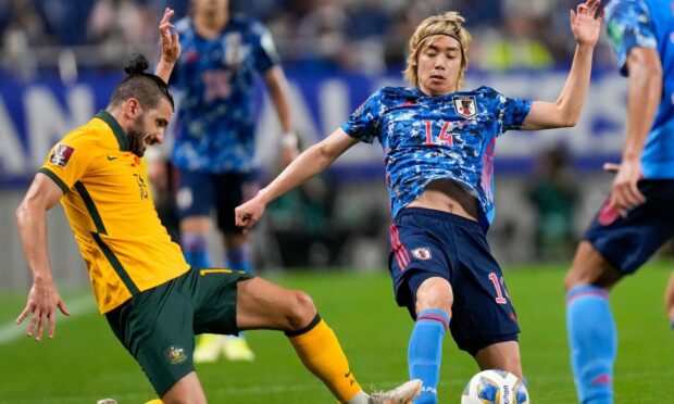 Aziz Behich, left, in action against Japan.