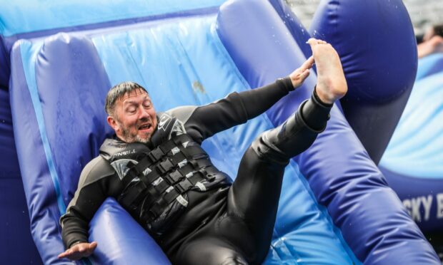 Fun on the inflatable playground at Wild Shore, Dundee.